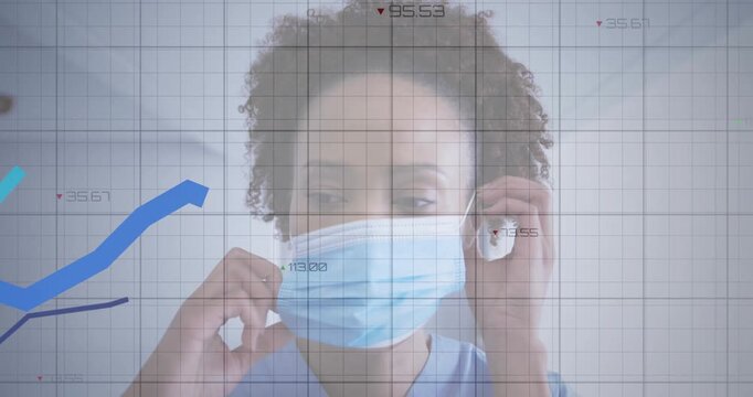Healthcare worker raising mask securing loops, activating gridlines and rising health data graphs