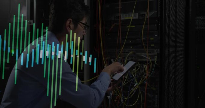 Data center engineer crouching tapping tablet reseating cables as overlay tracking network traffic