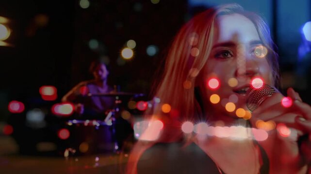 Lighting cue starting singer holding mic, singing in bokeh, conveying mood, drummer keeping beat