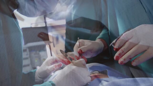 Surgeon using scalpel, assistant passing needle, camera lifting, overlays showing suture for repair