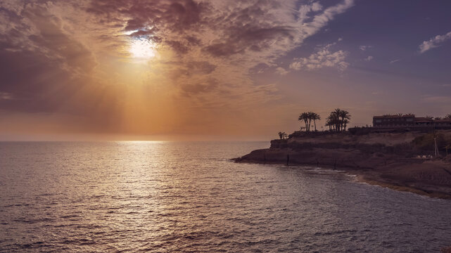 Sunset over the Atlantic Ocean at Costa Adeje, Playa del Duque, Tenerife, Spain