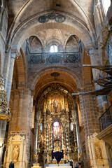 Fototapeta premium Interior view of a grand church with ornate decorations.. Ávila, Spain