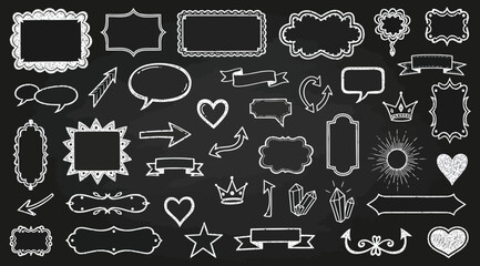 Set of handdrawn chalk style frames, banners, speech bubbles, and decorative elements on a blackboard © S.Siam