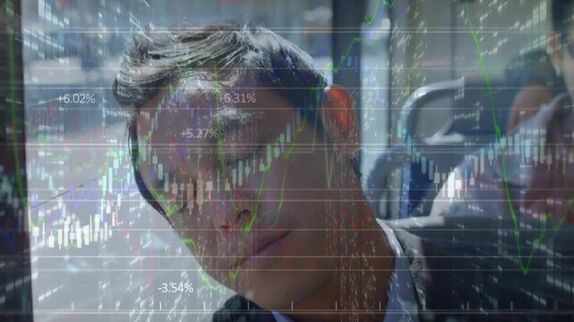 Animation of financial data and graphs over tired asian businessman sleeping in bus