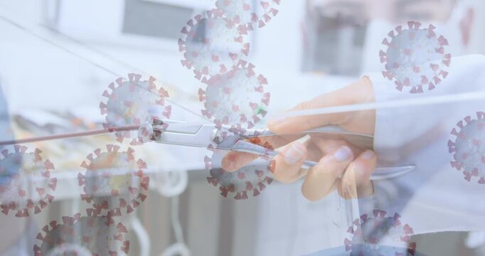 Animation of virus cells over caucasian scientist in lab