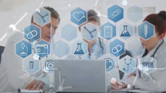 Animation of medical icons and data processing over caucasian doctors using tablet
