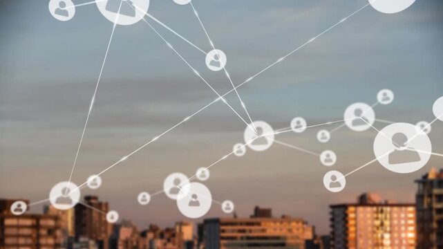 Animation of network of profile icons over aerial view of tall buildings against the sky