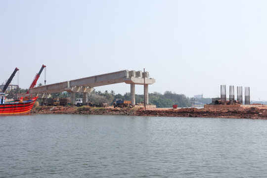 An Under construction site of a bridge on a river in Mangalore city to ease the traffic congestion in Karnataka, India.