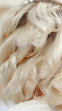 Woman with new haircut shake with head left and right in slow motion