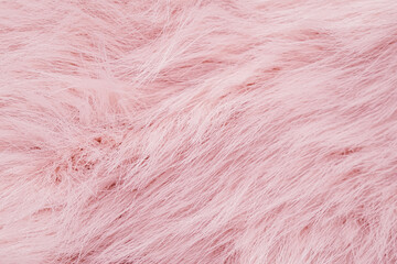 Fototapeta premium Soft beautiful light pink fluffy luxurious textile material forms an elegant cozy background texture