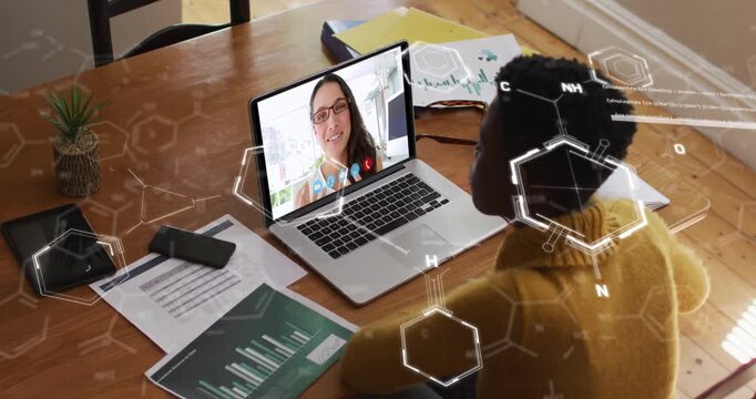 Animation of chemical formulas over african american woman having video call on laptop