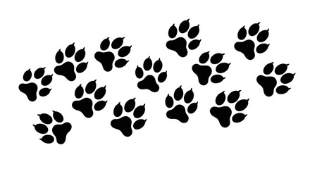 Fototapeta premium Black animal paw prints on a white background.