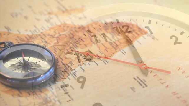 Animation of clock with moving seconds hand over compass on moving world map