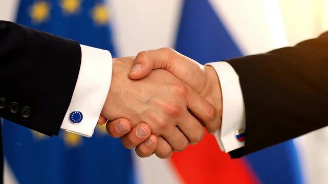 businessmen in suits shaking hands with cufflinks featuring flags of european union and russia representing business dialogue and economic cooperation