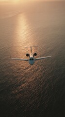 Fototapeta premium Small private jet viewed from above flying over calm ocean reflecting warm sunset light with long shadows textured water surface cinematic aerial perspective and minimal composition