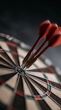 Close up of dartboard with three red darts clustered in bullseye shallow depth of field emphasizing precision accuracy and success concept