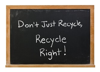 Fototapeta premium Don't just recycle, recycle right written in white chalk on a black chalkboard in a wooden frame isolated on white