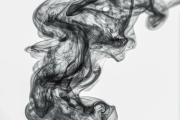 Fototapeta premium A black and white photo of smoke in the air, ideal for use in editorial or documentary contexts. vertical frame
