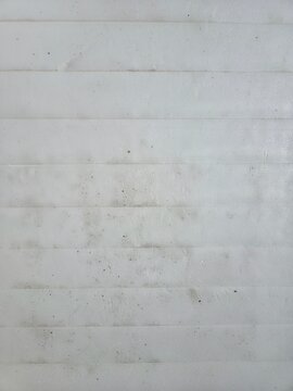 Close-up of stacked clean white EPS panels for industrial parts