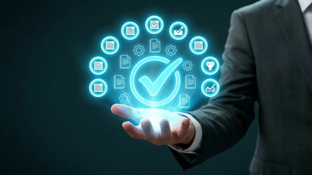 Businessman holding glowing checkmark icon with digital business applications and technology symbols