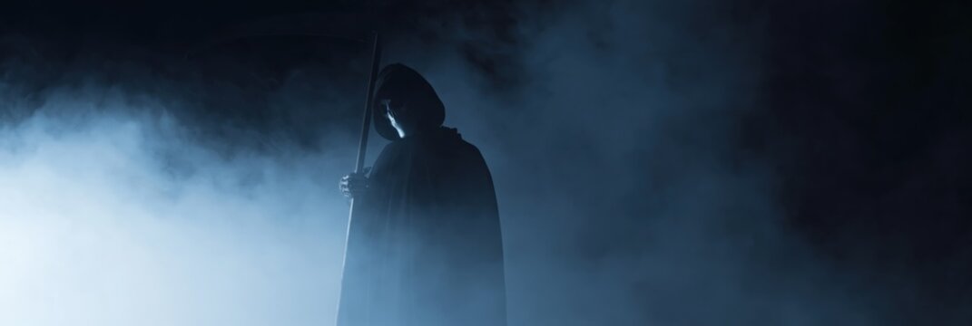 Hooded grim reaper standing smoke scythe mysterious dark foggy silhouette horror scene lone figure atmospheric foreboding mood