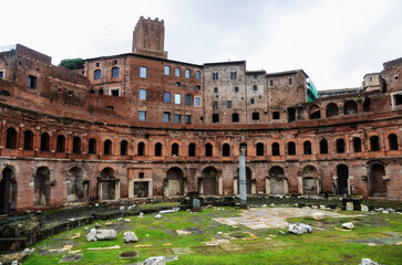 Fototapeta premium Ancient Roman ruins with circular brick structure and arches