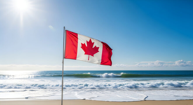 Canadian flag waving on a beach