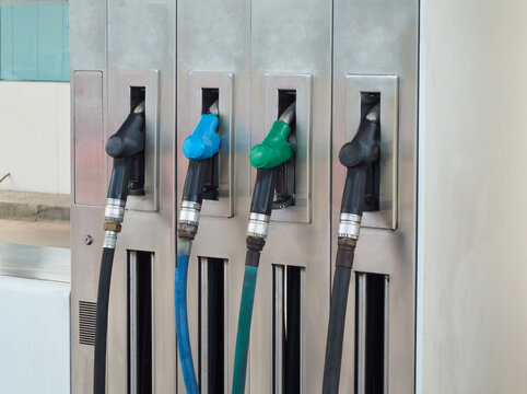 Pump at gas station for service, fuel and transport cost for energy, drive and quality petrol economy. Travel, gasoline price increase and garage to refuel tank with diesel product for road trip.