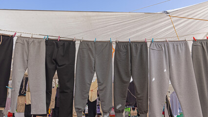 Comfy Cotton Fleece Jogger Sweatpants Bottoms Hanging at Clothesline Sky © markobe