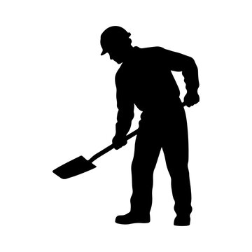Silhouette of a construction worker digging with a shovel
