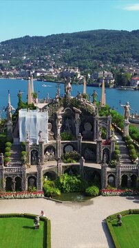 A drone view of the island of Isola Bella in Italy. Vertical video