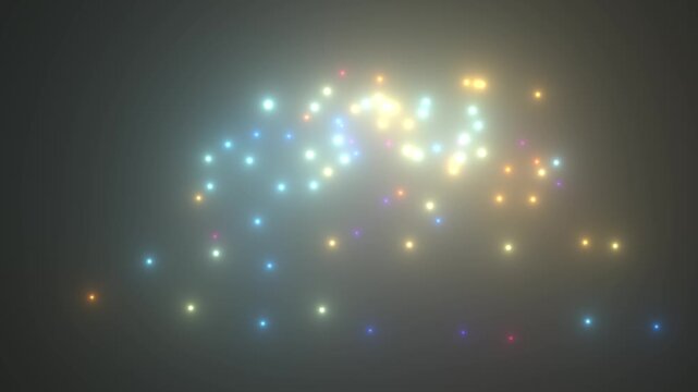 Abstract cloud of glowing colorful particles on a dark background
