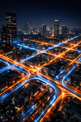 Fototapeta premium Cityscape at Night: An awe-inspiring nighttime vista of a sprawling cityscape, adorned with the radiant trails of vehicle lights, evokes a sense of connectivity and urban dynamism. 