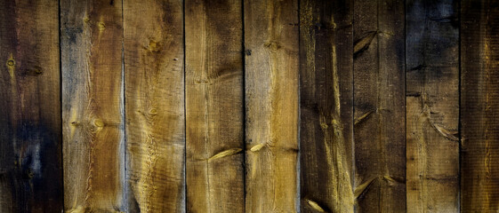 Fototapeta premium Verwittetes braunes Holz als Hintergrund