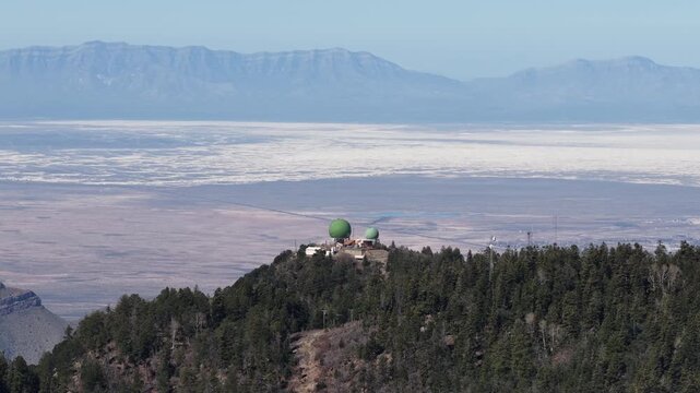 Aerial Alamo Peak observatory and White Sands national park in background Cloudcroft New Mexico