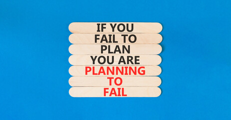 Planning to fail symbol. Concept words If you fail to plan you are planning to fail on beautiful wooden sticks. Beautiful blue paper background. Business planning to fail concept. Copy space. © Dzmitry