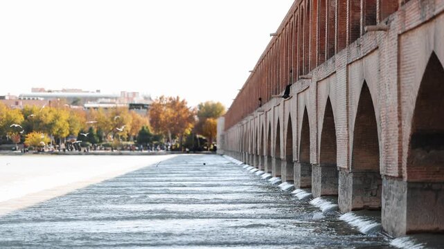 Khaju Bridge in Isfahan, Iran, historic stone bridge with traditional arches over the Zayandeh River. Famous Persian landmark and cultural heritage site in the Old City of Isfahan