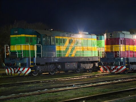 Vivid train silhouette against contrasting units showcases detailed textures and lighting effects