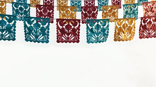 Colorful papel picado banners strung overhead, festive Cinco de Mayo decorations, traditional Mexican celebration backdrop, holiday event design concept