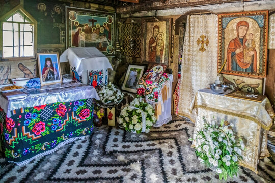DESESTI, ROMANIA - SEPT. 19, 2020: Interior of Saint Parascheva Church, a Romanian Orthodox church built in 1770, one of eight wooden churches of Maramures that make up the UNESCO World Heritage Site.