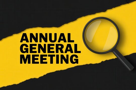 Annual General Meeting conceptual sign with magnifying glass