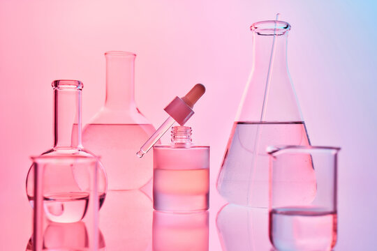 Skincare research creating beauty products with laboratory glassware