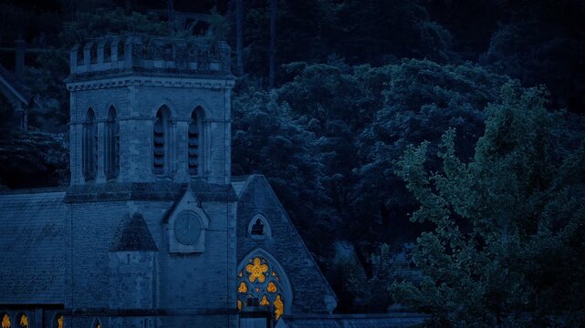 Church In The Evening Buidling With Lit Up Windows