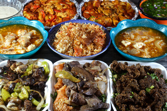 grilled chicken internal livers, gizzards, kidneys, hearts, fried beef liver, mixed meat and offal Meshakel, Pasta Casserole, boneless cow feet in soup, Egyptian Fattah with white rice, crispy bread
