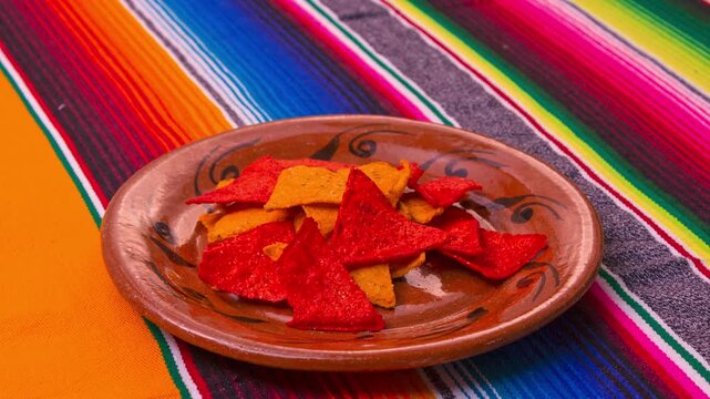 Mexican food preparation of tortilla chips from corn