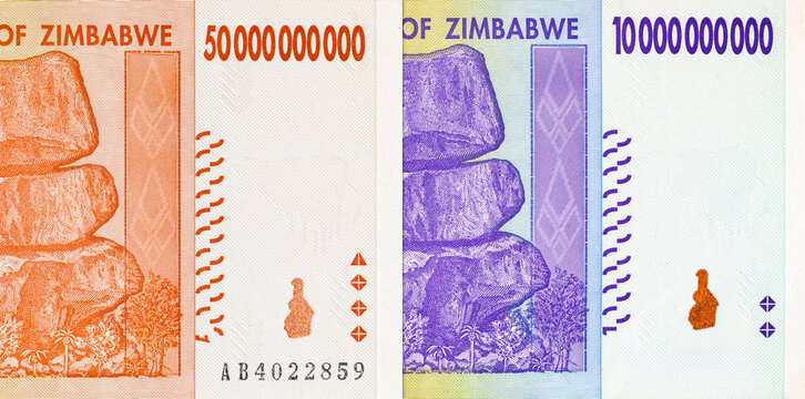 Banknotes from Zimbabwe's 2008 hyperinflation period, featuring the 10 Billion and 50 Billion dollar denominations. African currency.