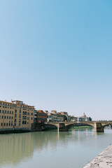 Fototapeta premium Tranquil Waterfront Scenery Reflecting Colorful Building Facades