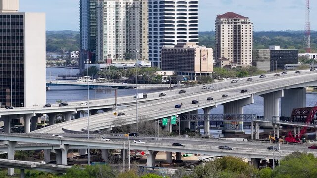 Aerial footage of cars driving on a highway in Jacksonville Florida USA
