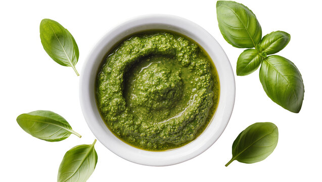 Fresh green pesto in white bowl with basil leaves, isolated on transparent background