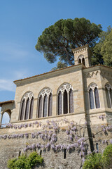 Heritage Stone Estate Boasts Flowering Wisteria And Gothic Arches © VolodymyrNadtochii
